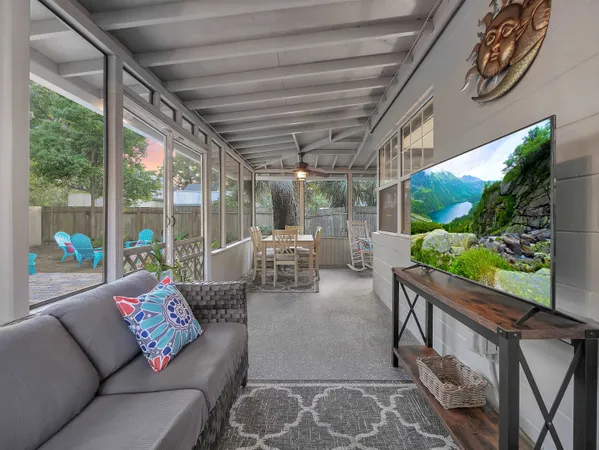 a view of a backyard with a patio and fire pit