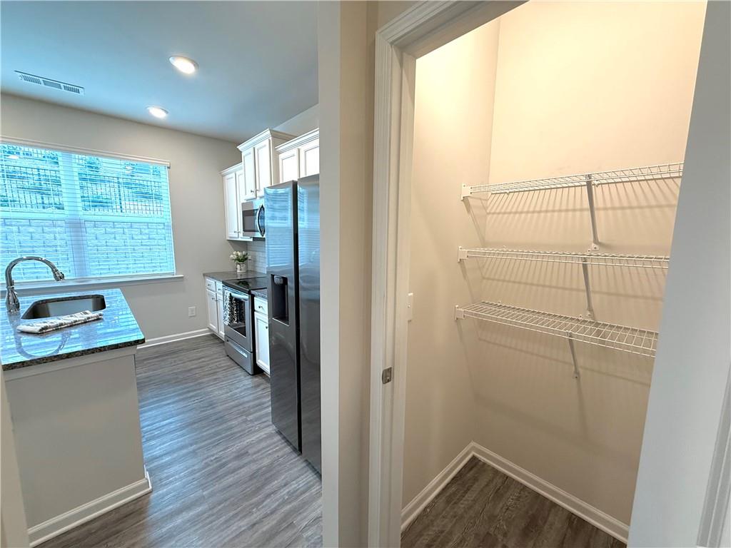 276 Whitetail Circle Canton, GA 30115 - Photo 15 of 40 a view of a kitchen with a window