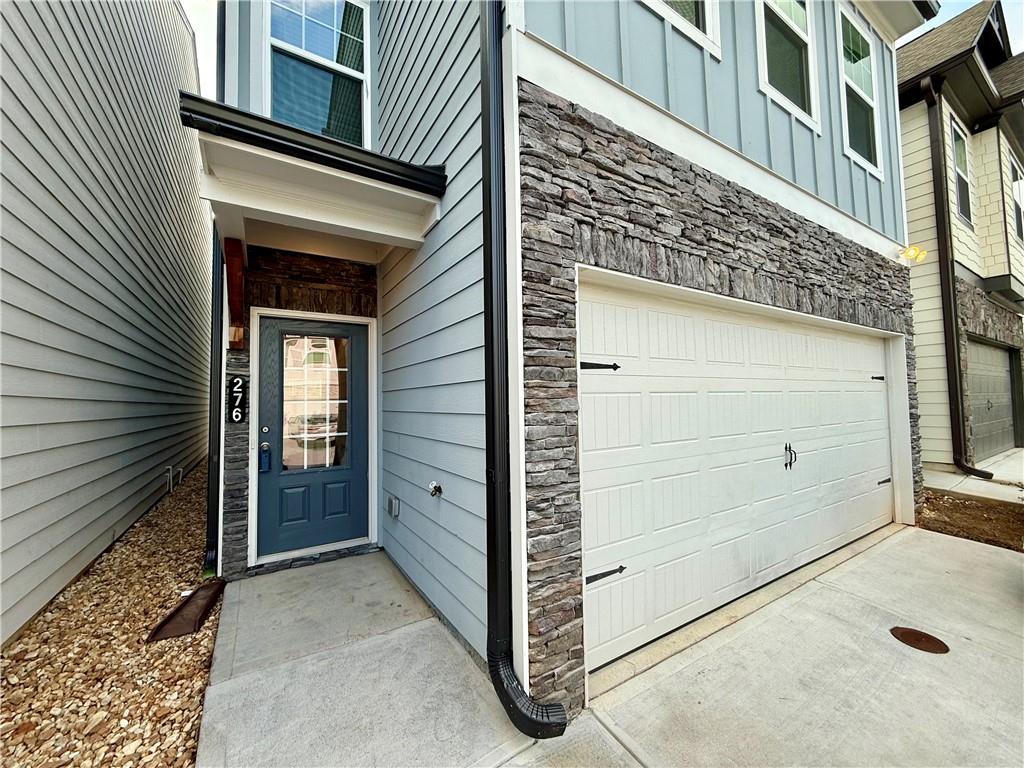 276 Whitetail Circle Canton, GA 30115 - Photo 2 of 40 an entrance view of a house