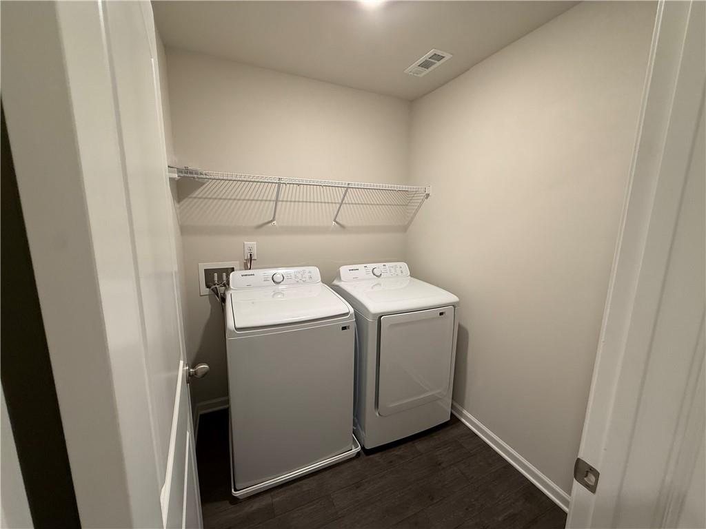 276 Whitetail Circle Canton, GA 30115 - Photo 29 of 40 a utility room with dryer and washer
