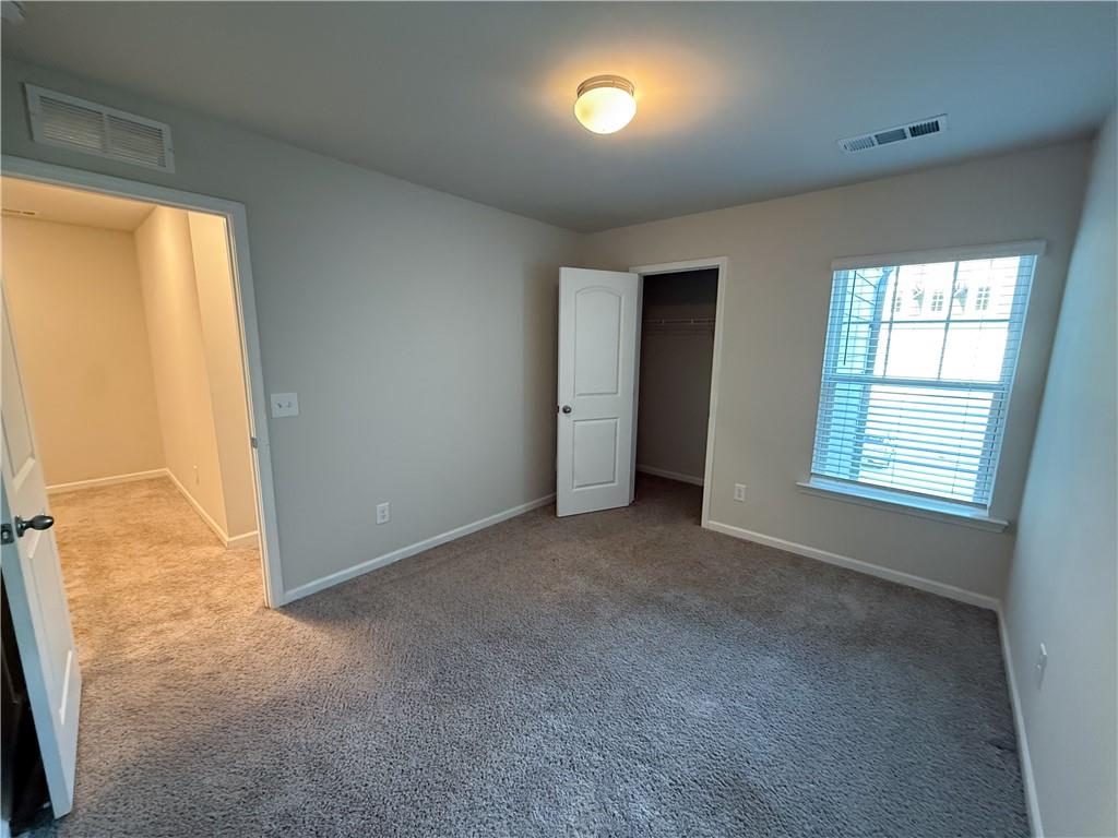 276 Whitetail Circle Canton, GA 30115 - Photo 36 of 40 an empty room with windows