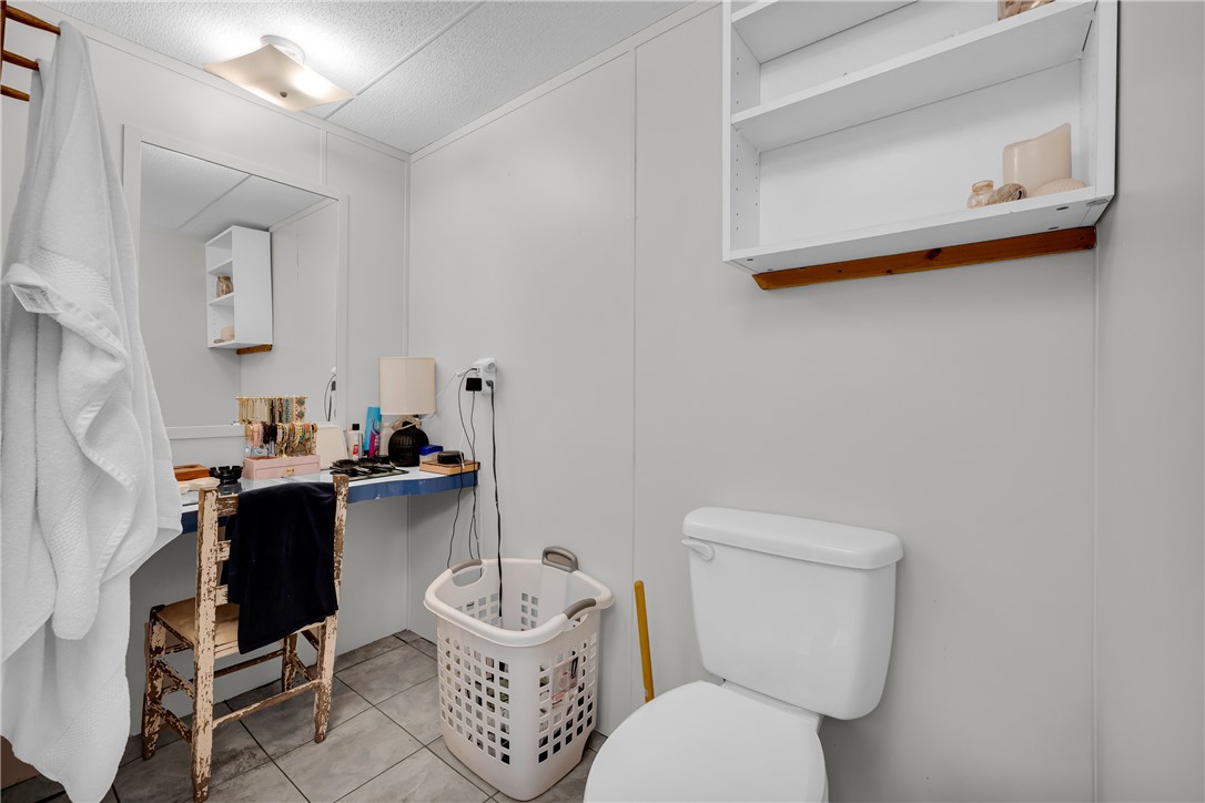 162 Newberry Road Walhalla, SC 29691 - Photo 21 of 50 Functional bathroom space offers ample counter area and practical wall shelving for everyday convenience.