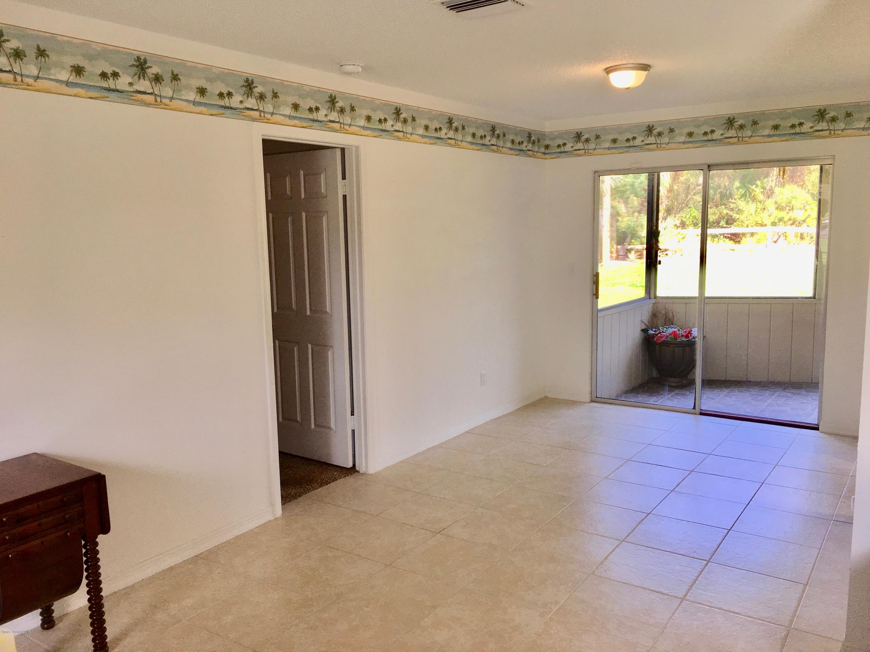 853 Furth Road Northwest Palm Bay, FL 32907 - Photo 13 of 29 a view of an empty room with a window