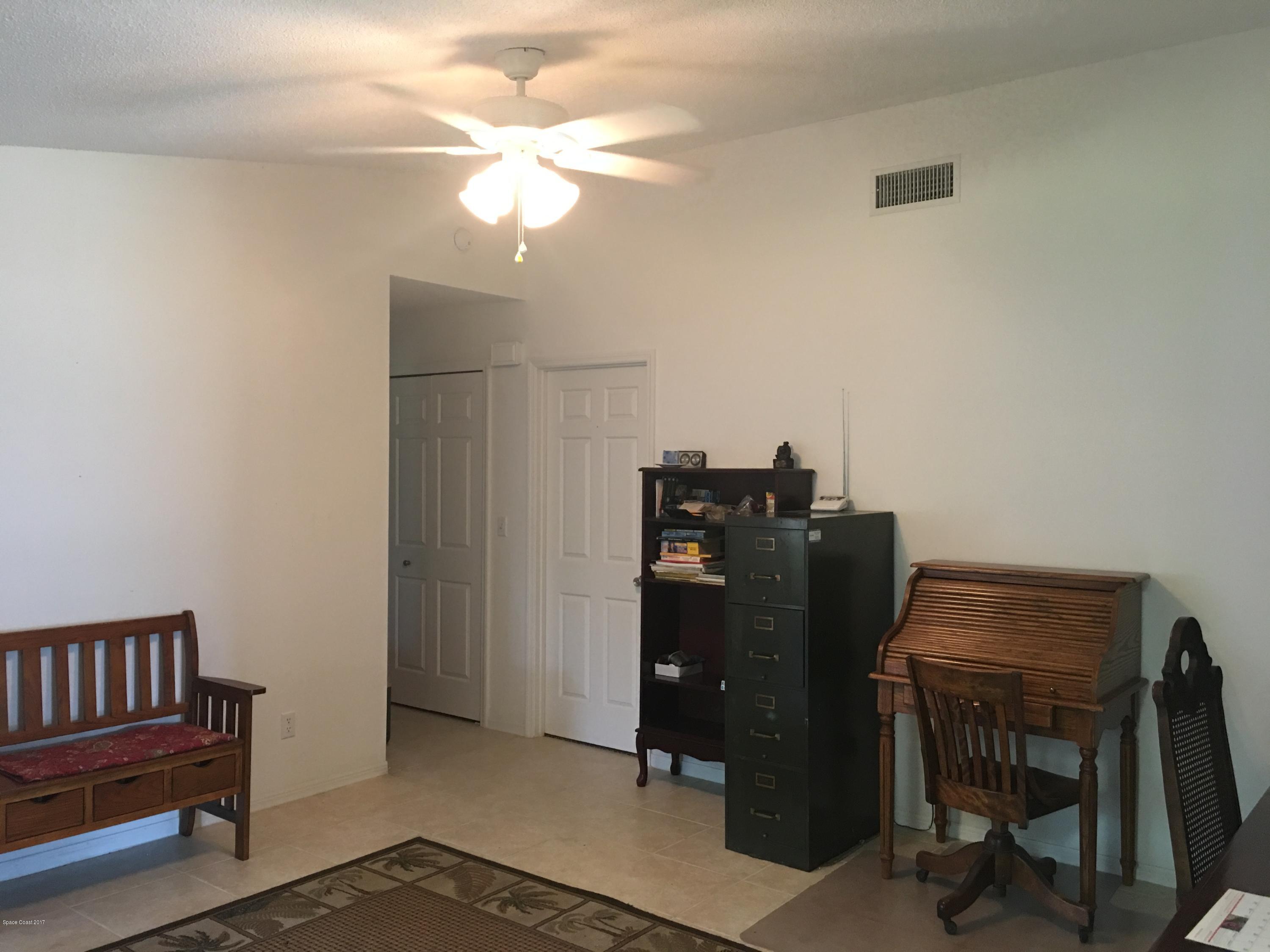 853 Furth Road Northwest Palm Bay, FL 32907 - Photo 10 of 29 a view of a workspace with furniture