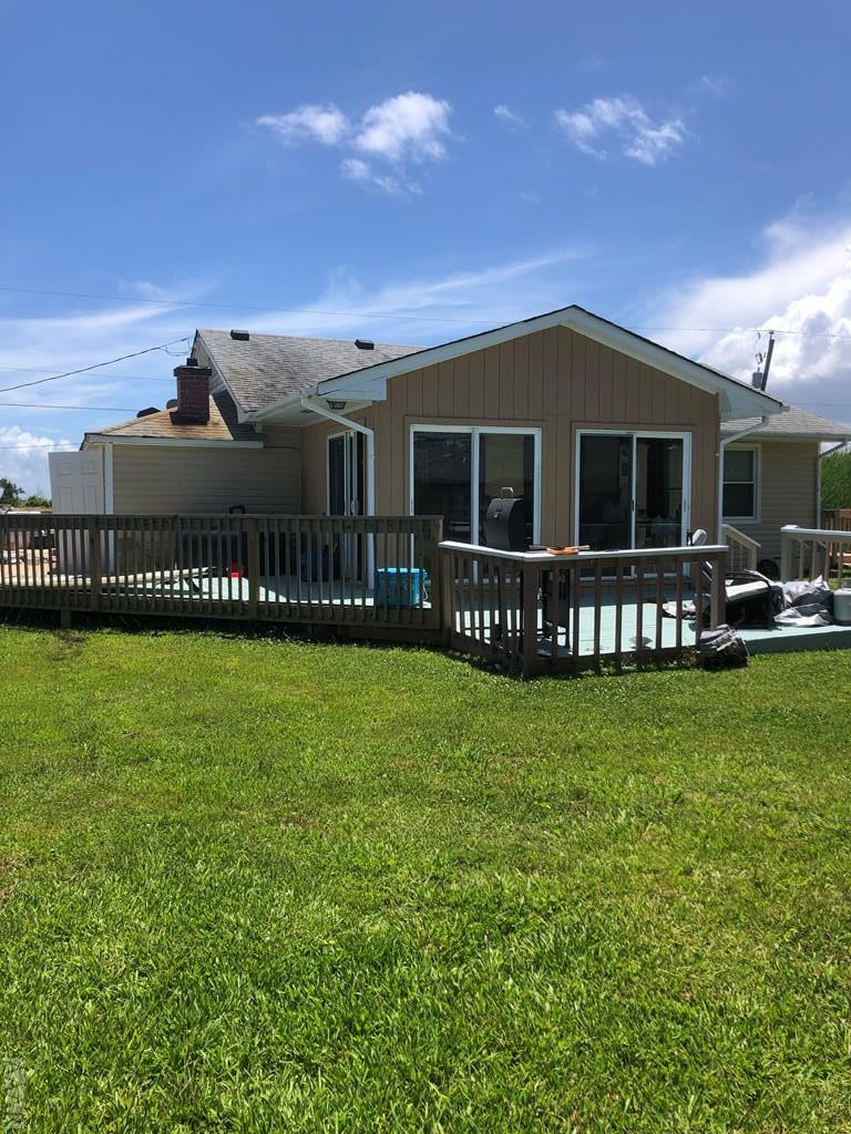 177 Cason Point Road Knotts Island, NC 27950 - Photo 3 of 13 Rear exterior. 3 sets of fairly new sliders for th