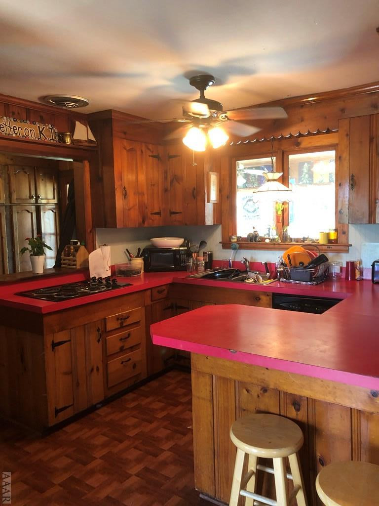 177 Cason Point Road Knotts Island, NC 27950 - Photo 8 of 13 Cute cabin-y kitchen.