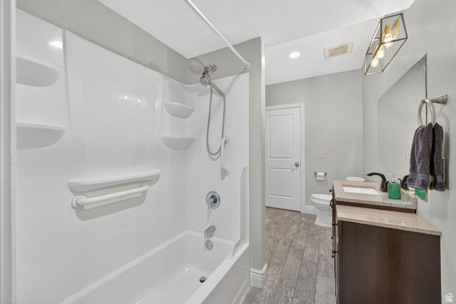 14738 Tangle Hill Road Herriman, UT 84096 - Photo 50 of 66 White tub/shower combination with integrated shelving