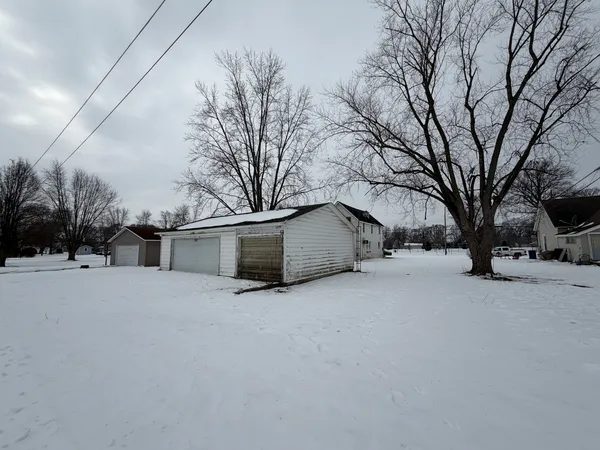 a view of a house with snow covered with snow