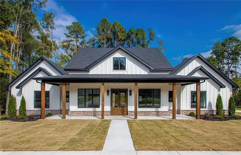 front view of a house with a yard