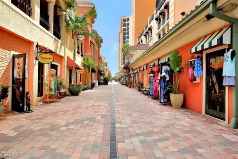 a view of a building with traffic signal lights