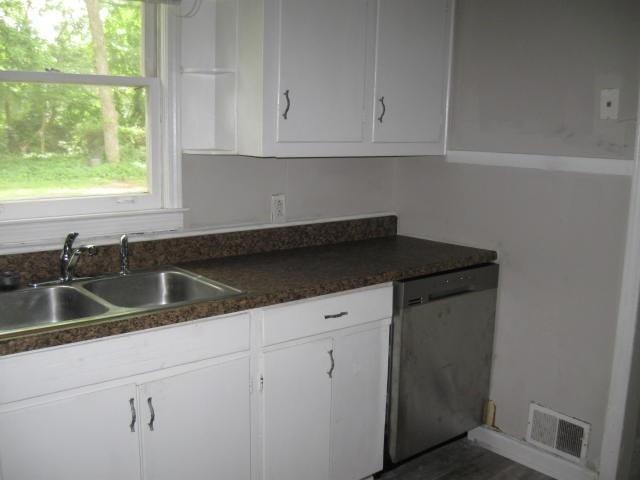 2128 Morris Avenue Tucker, GA 30084 - Photo 3 of 5 a kitchen with a sink cabinets and window
