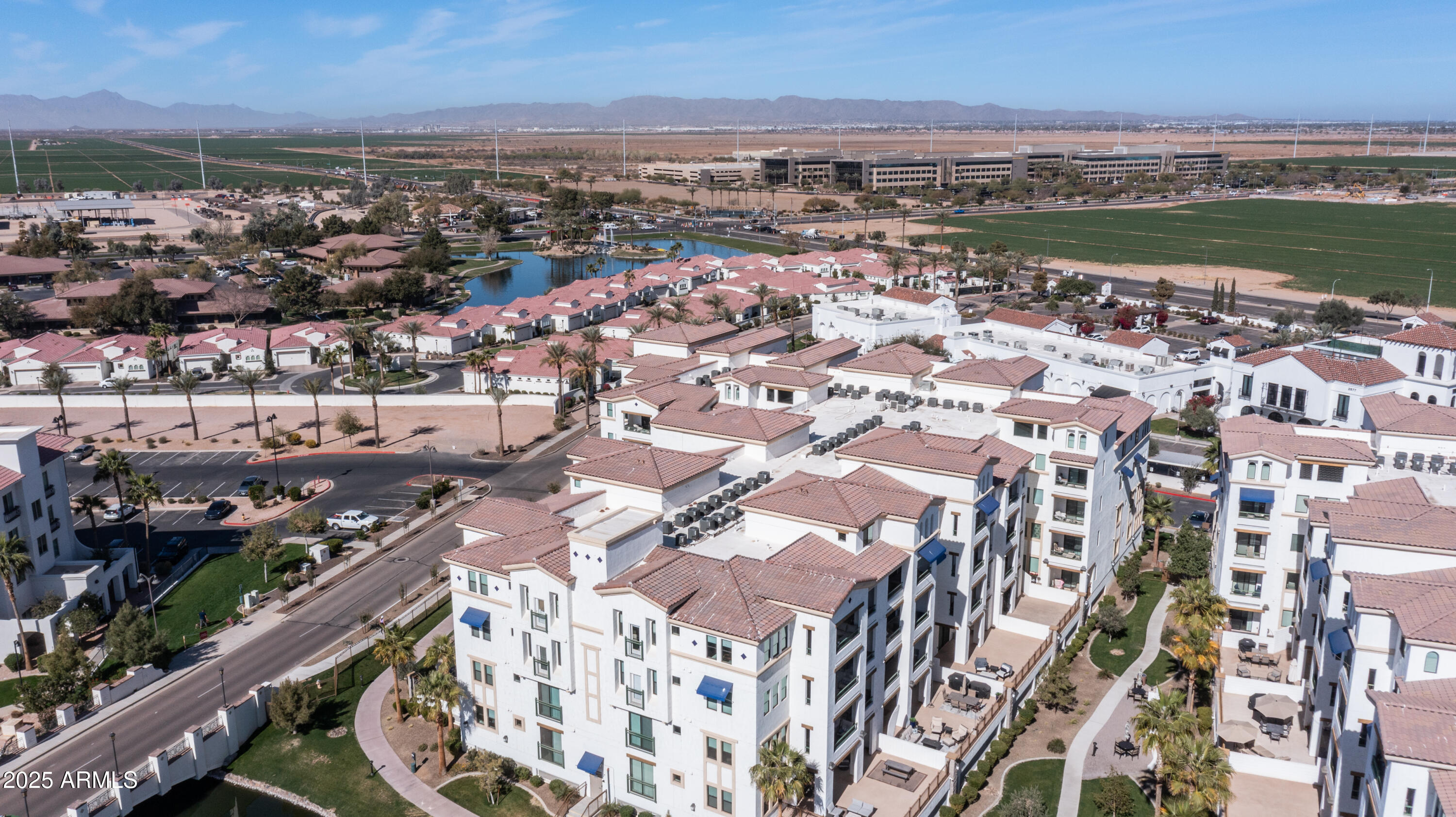 2511 West Queen Creek Road, Unit 479 Chandler, AZ 85248 - Photo 58 of 68 an aerial view of a city with lots of residential buildings
