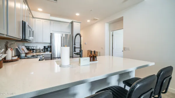 a kitchen with a stove and a microwave
