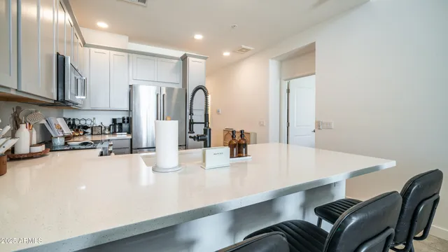 a kitchen with a stove and a microwave