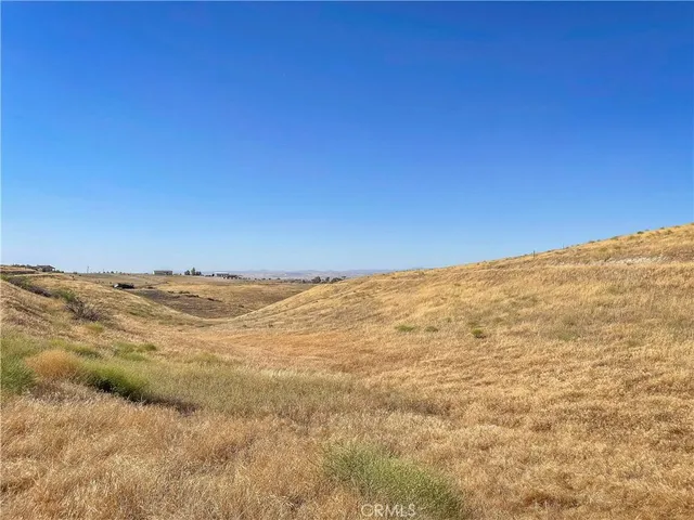 a view of ocean and mountain