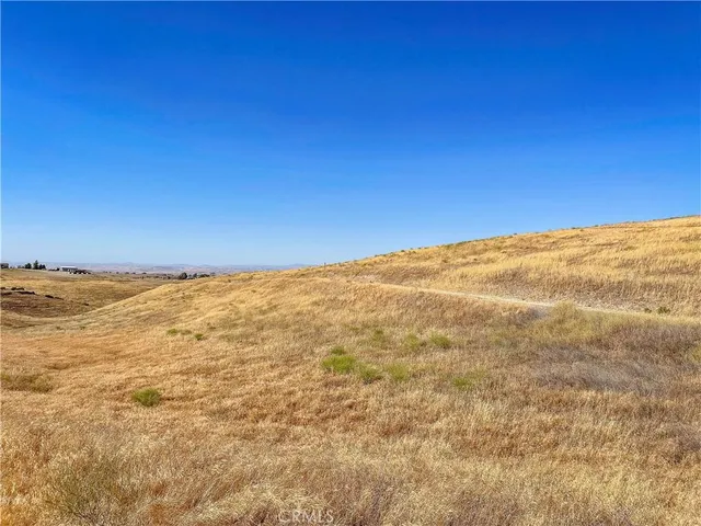 a view of ocean and mountains