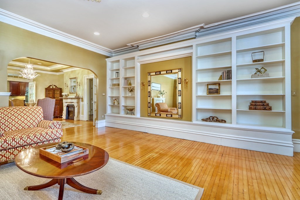 5 Chestnut Street Melrose, MA 02176 - Photo 11 of 42 a living room with furniture and a rug