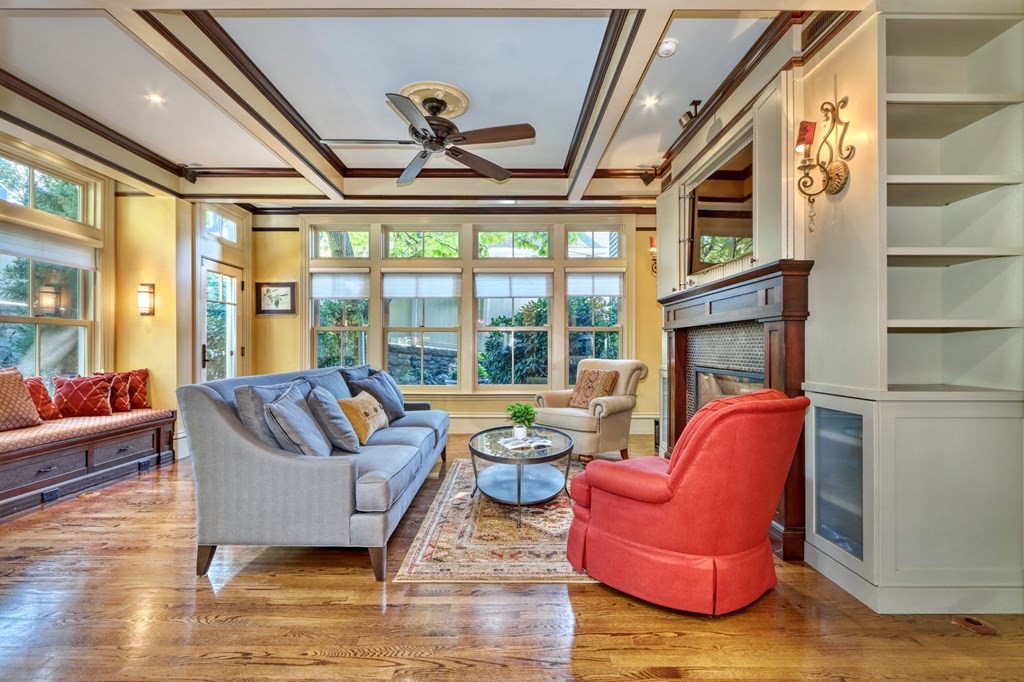 5 Chestnut Street Melrose, MA 02176 - Photo 19 of 42 a living room with furniture fireplace and a large window