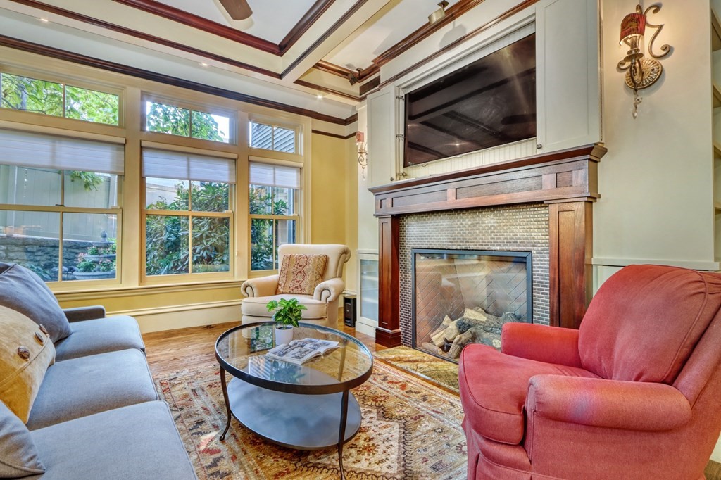 5 Chestnut Street Melrose, MA 02176 - Photo 20 of 42 a living room with furniture and a fireplace