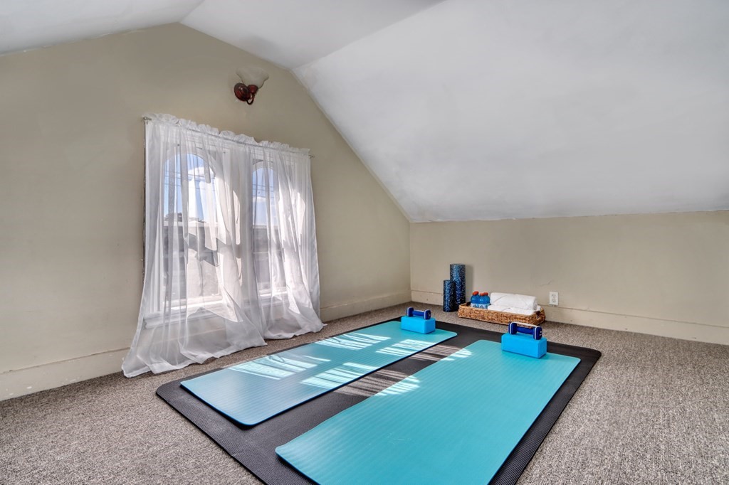 5 Chestnut Street Melrose, MA 02176 - Photo 32 of 42 a room with chair and window