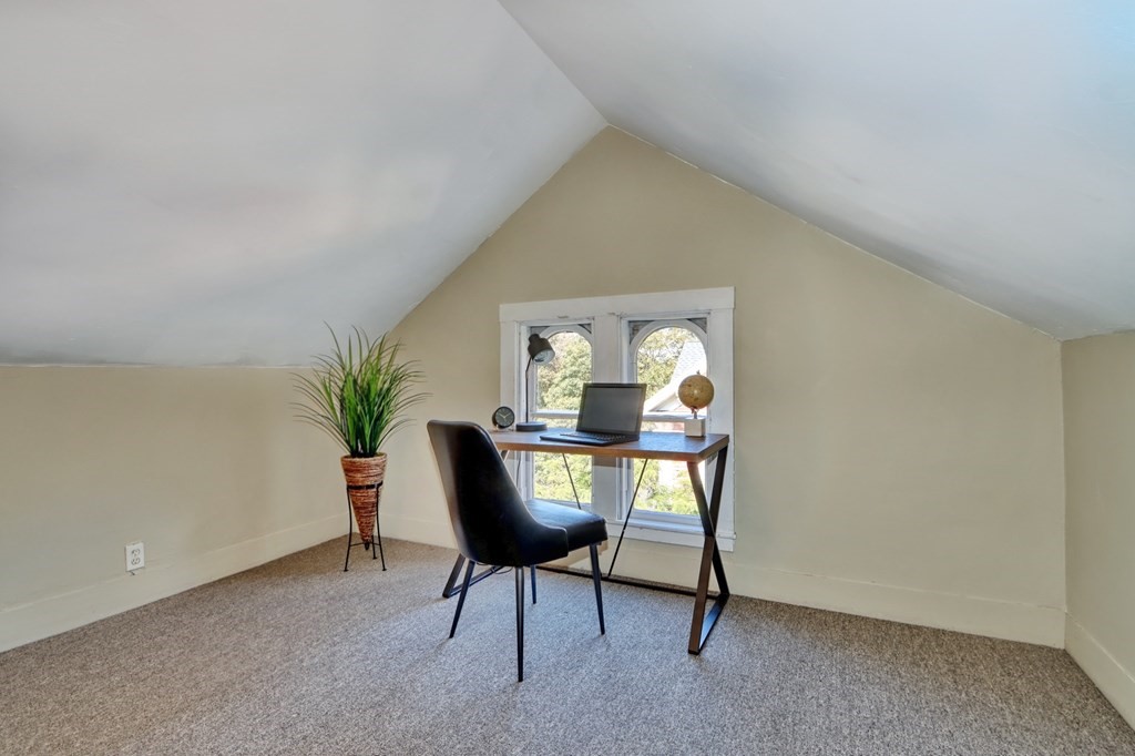 5 Chestnut Street Melrose, MA 02176 - Photo 34 of 42 a workspace with furniture and a potted plant