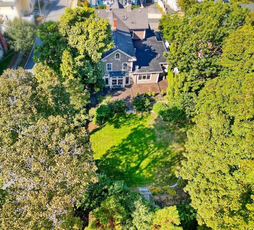 5 Chestnut Street Melrose, MA 02176 - Photo 35 of 42 an aerial view of a house with a yard swimming pool and outdoor seating