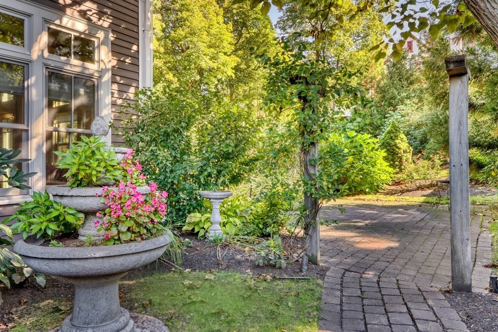 5 Chestnut Street Melrose, MA 02176 - Photo 37 of 42 a view of a garden with pathway