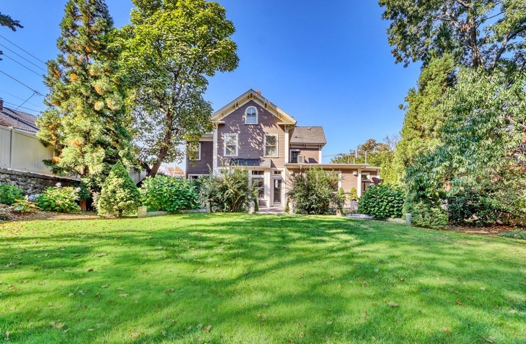 5 Chestnut Street Melrose, MA 02176 - Photo 41 of 42 a front view of a house with a yard