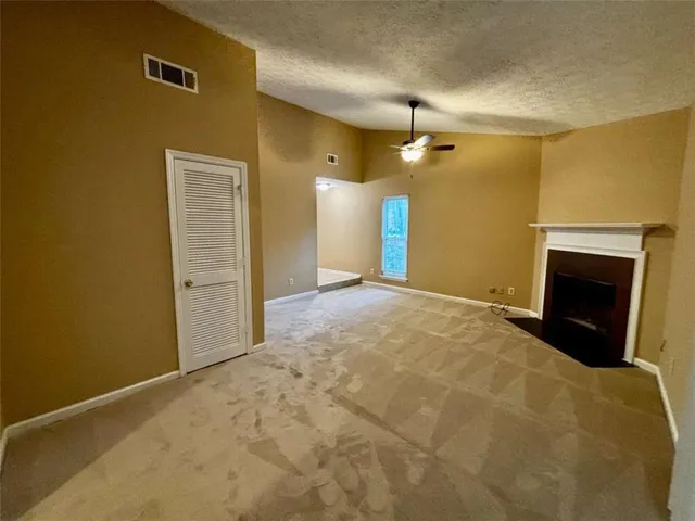 a view of a livingroom with a fireplace