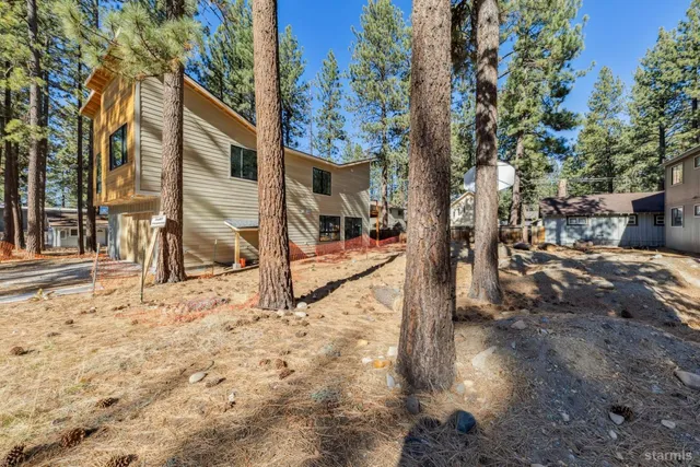 a view of a swimming pool with sitting area