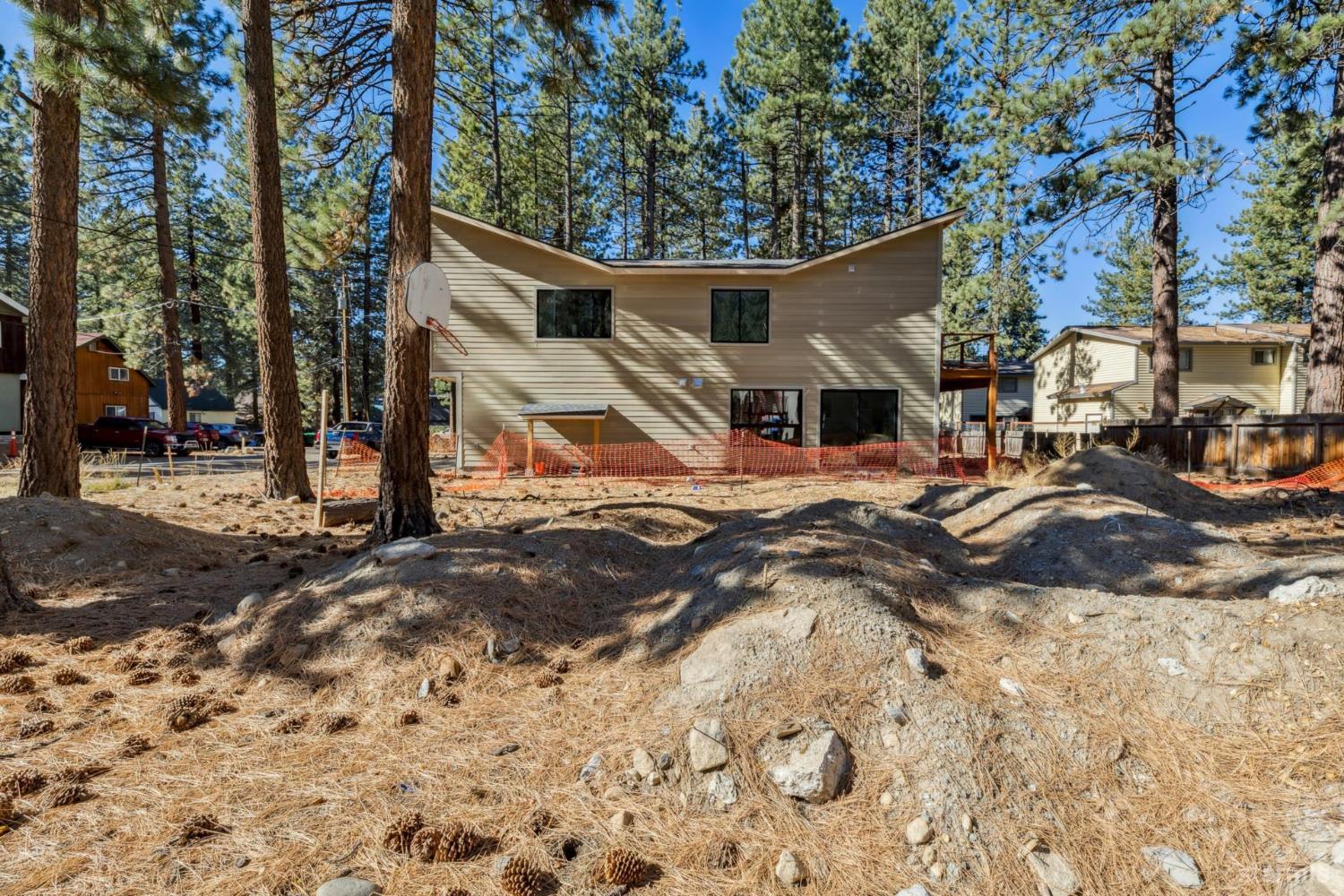 3689 Primrose Road South Lake Tahoe, CA 96150 - Photo 16 of 20 a view of a house with a snow on the yard and covered with snow