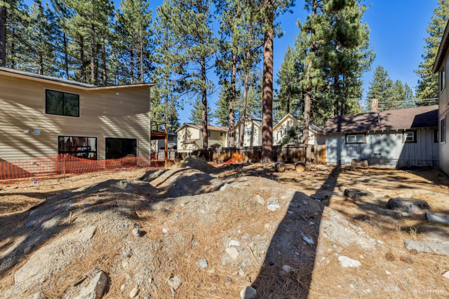 3689 Primrose Road South Lake Tahoe, CA 96150 - Photo 17 of 20 a view of a swimming pool with sitting area