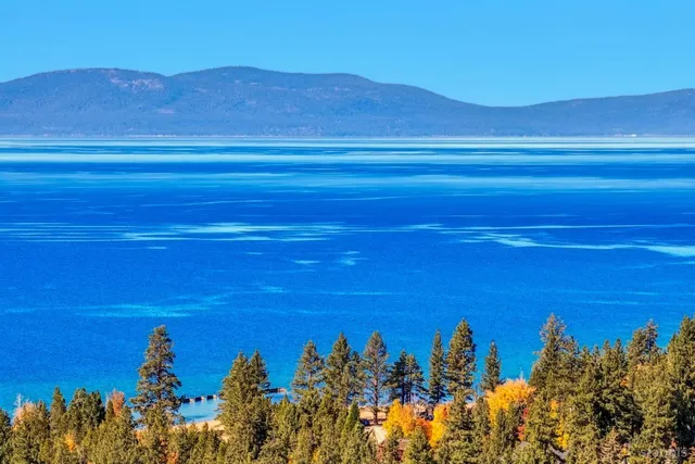 a view of a ocean with sunset view