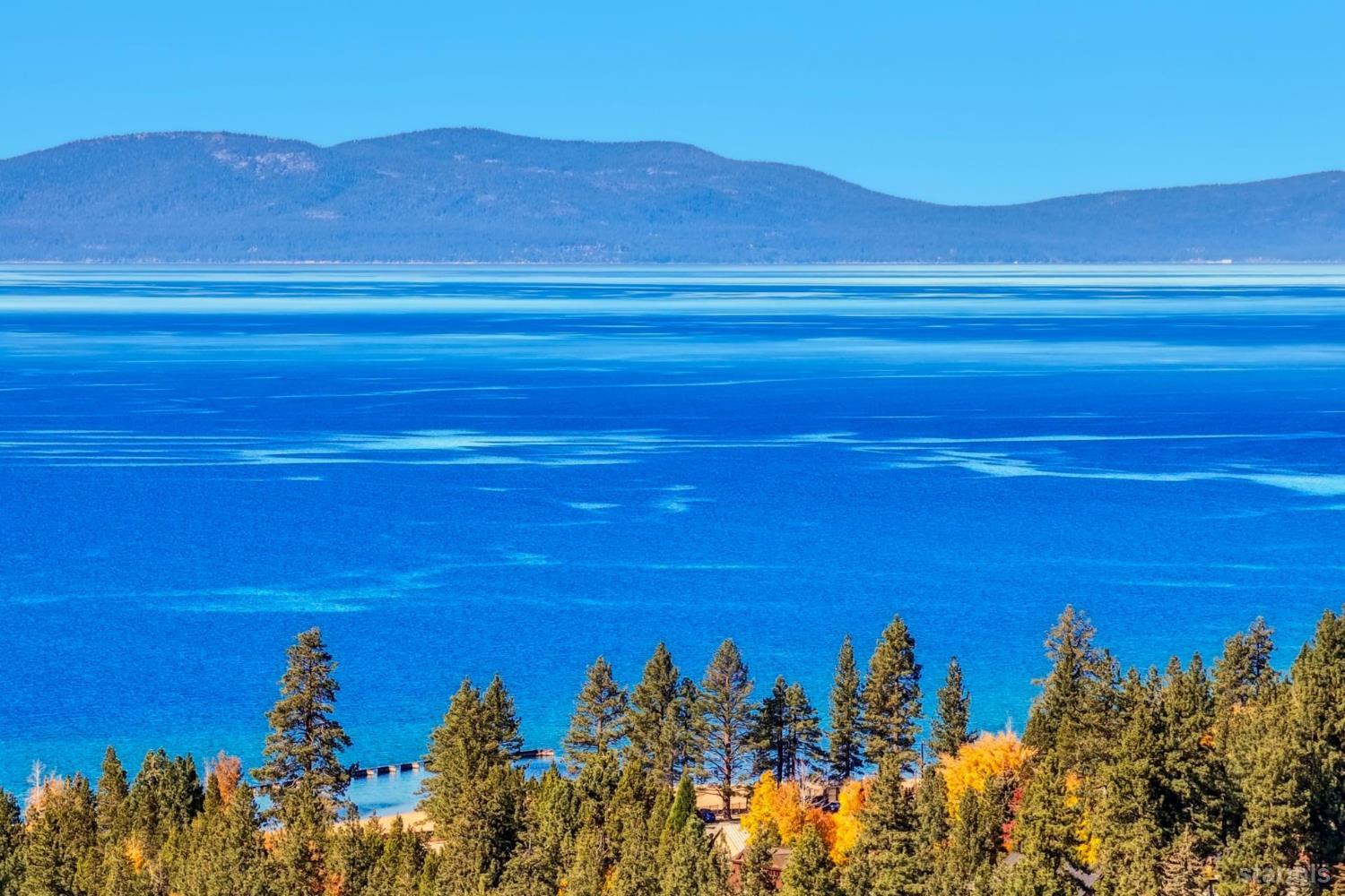 3689 Primrose Road South Lake Tahoe, CA 96150 - Photo 6 of 20 a view of a ocean with sunset view