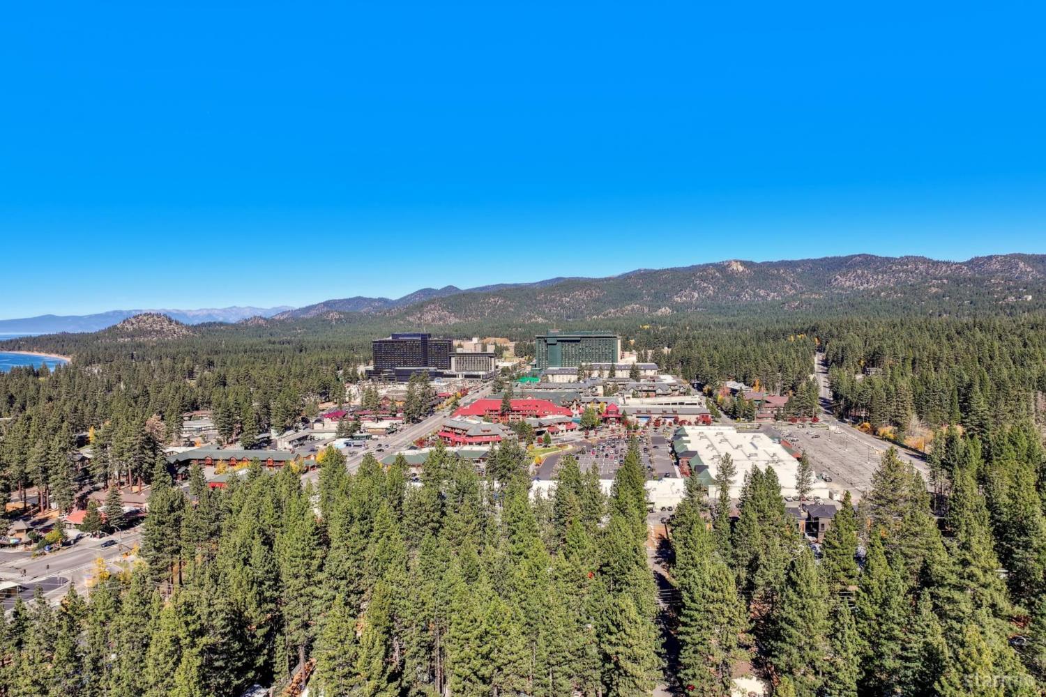 3689 Primrose Road South Lake Tahoe, CA 96150 - Photo 8 of 20 a view of a city with mountains in the background