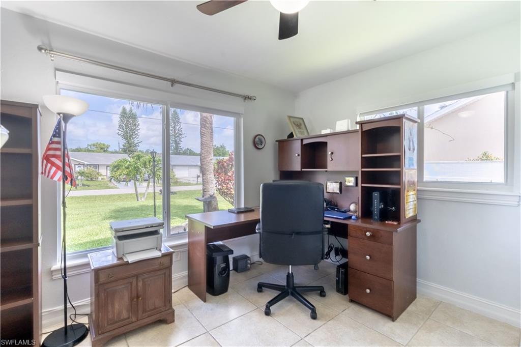 2100 55th Street Southwest Naples, FL 34116 - Photo 39 of 50 a work room with furniture and windows