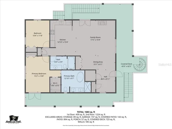 a kitchen with stainless steel appliances kitchen island granite countertop a refrigerator a stove a sink dishwasher and white cabinets with wooden floor
