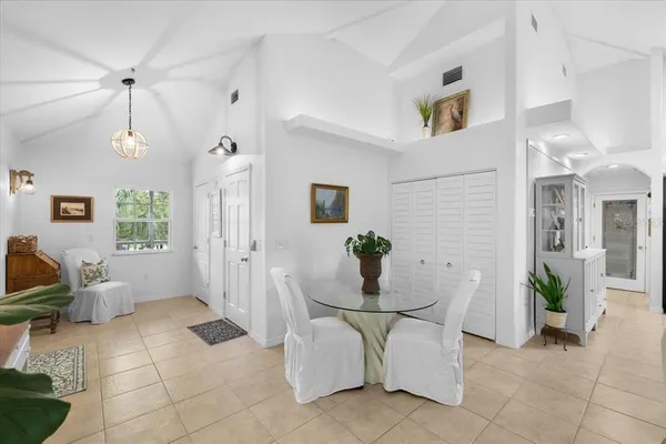 a bathroom with double vanity sinks and a mirror