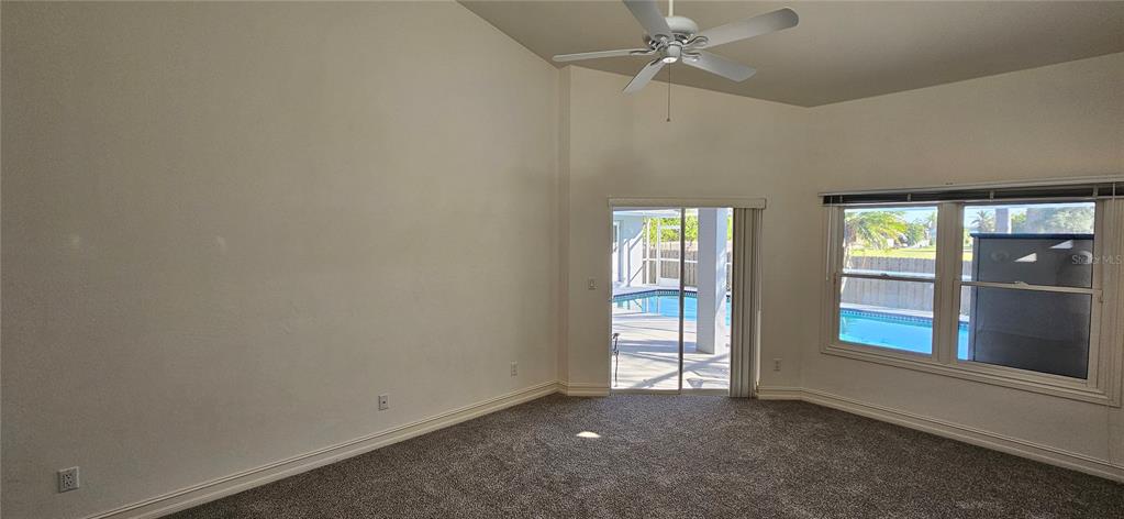 11729 Timberline Circle Fort Myers, FL 33966 - Photo 19 of 33 an empty room with windows