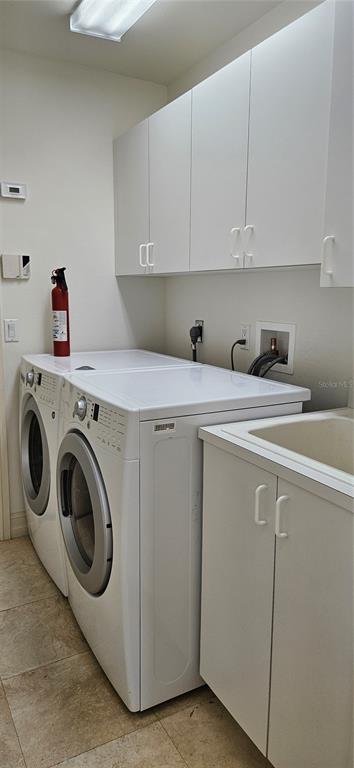 11729 Timberline Circle Fort Myers, FL 33966 - Photo 24 of 33 a utility room with dryer and washer
