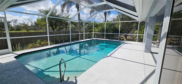 a view of a swimming pool with a porch