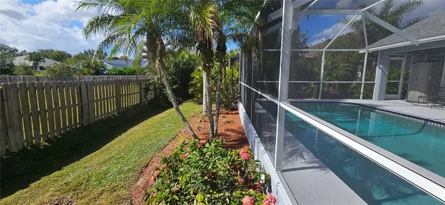 a view of a house with a swimming pool