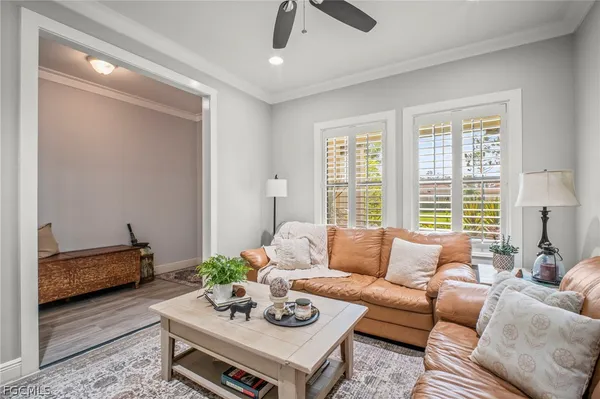 a living room with furniture and a table
