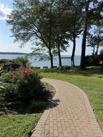 a view of a garden with a fountain
