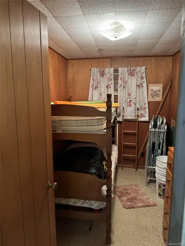 a room with furniture and stairs