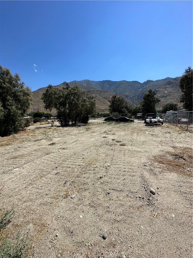 52232 Date Avenue Cabazon, CA 92230 - Photo 1 of 1 a backyard of a house with mountain view