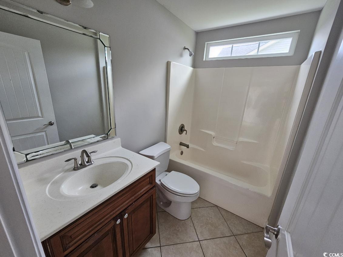 684 Rambler Court Myrtle Beach, SC 29588 - Photo 3 of 15 Full bath featuring vanity, shower / bath combination, and light tile patterned flooring
