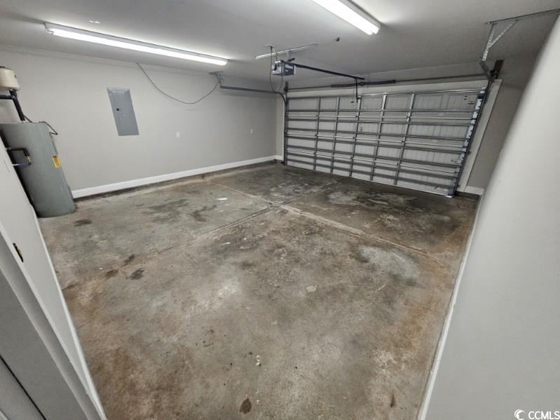 684 Rambler Court Myrtle Beach, SC 29588 - Photo 5 of 15 Garage with water heater and electric panel