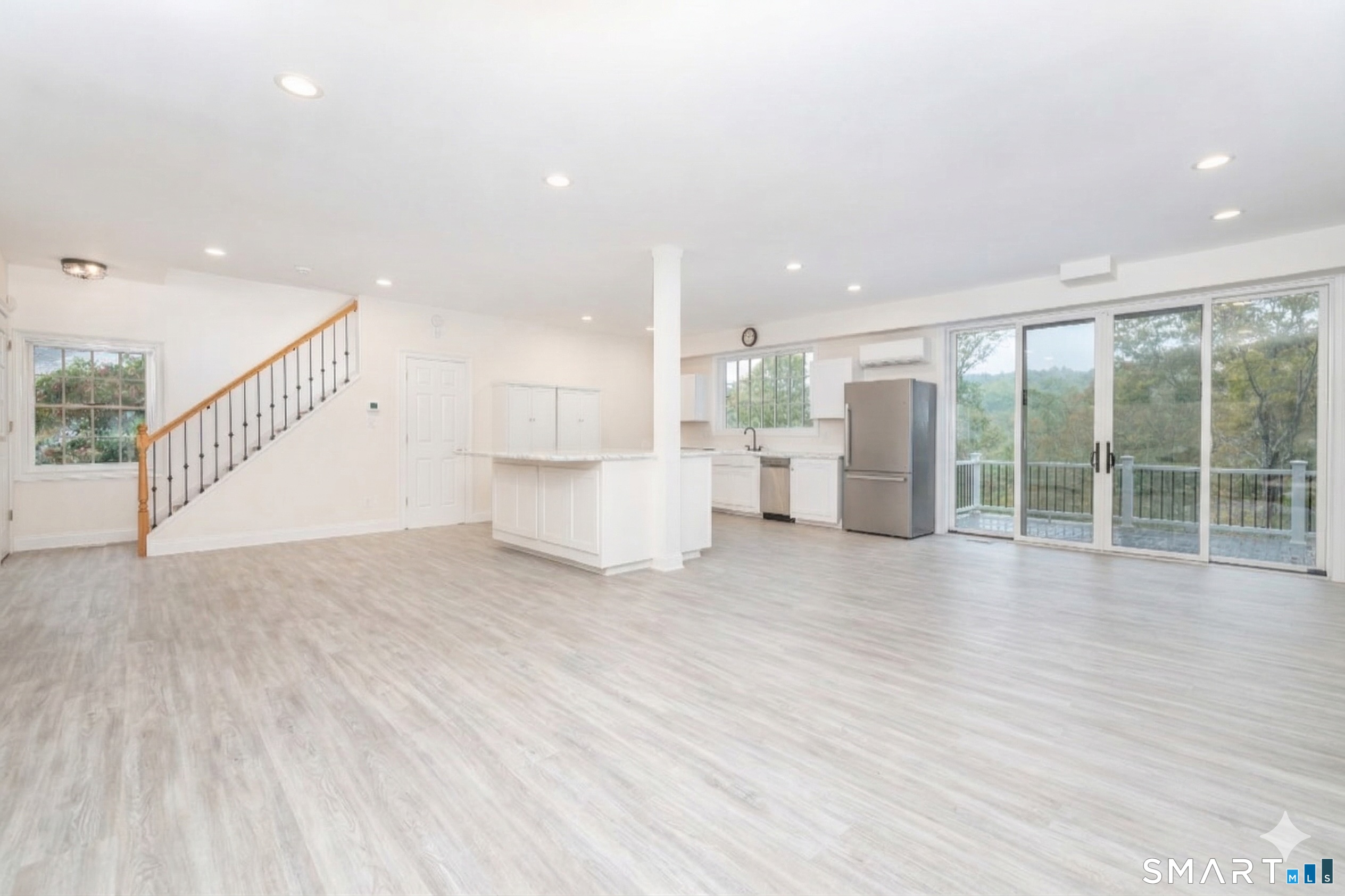 235 White Deer Rock Road, Unit GUEST Woodbury, CT 06798 - Photo 5 of 19 a view of work space with wooden floor and windows