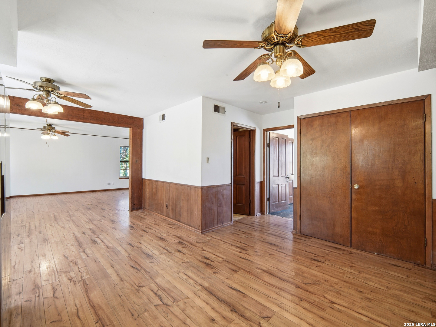 300 Ave M Hondo, TX 78861 - Photo 17 of 37 a view of a livingroom with a chandelier fan and wooden floor